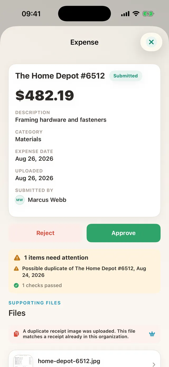An expense flagged as a possible duplicate before approval